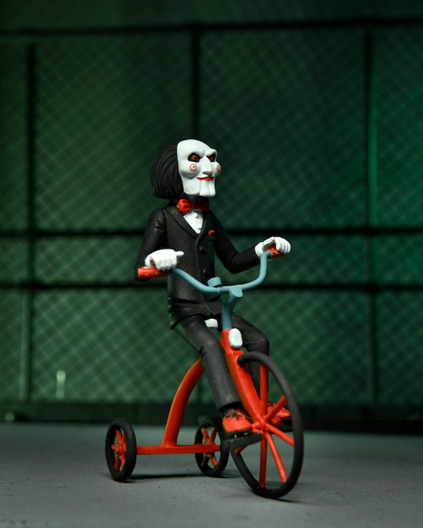 Saw: Toony Terrors Action Figure 2-Pack: Jigsaw Killer & Billy Tricycle