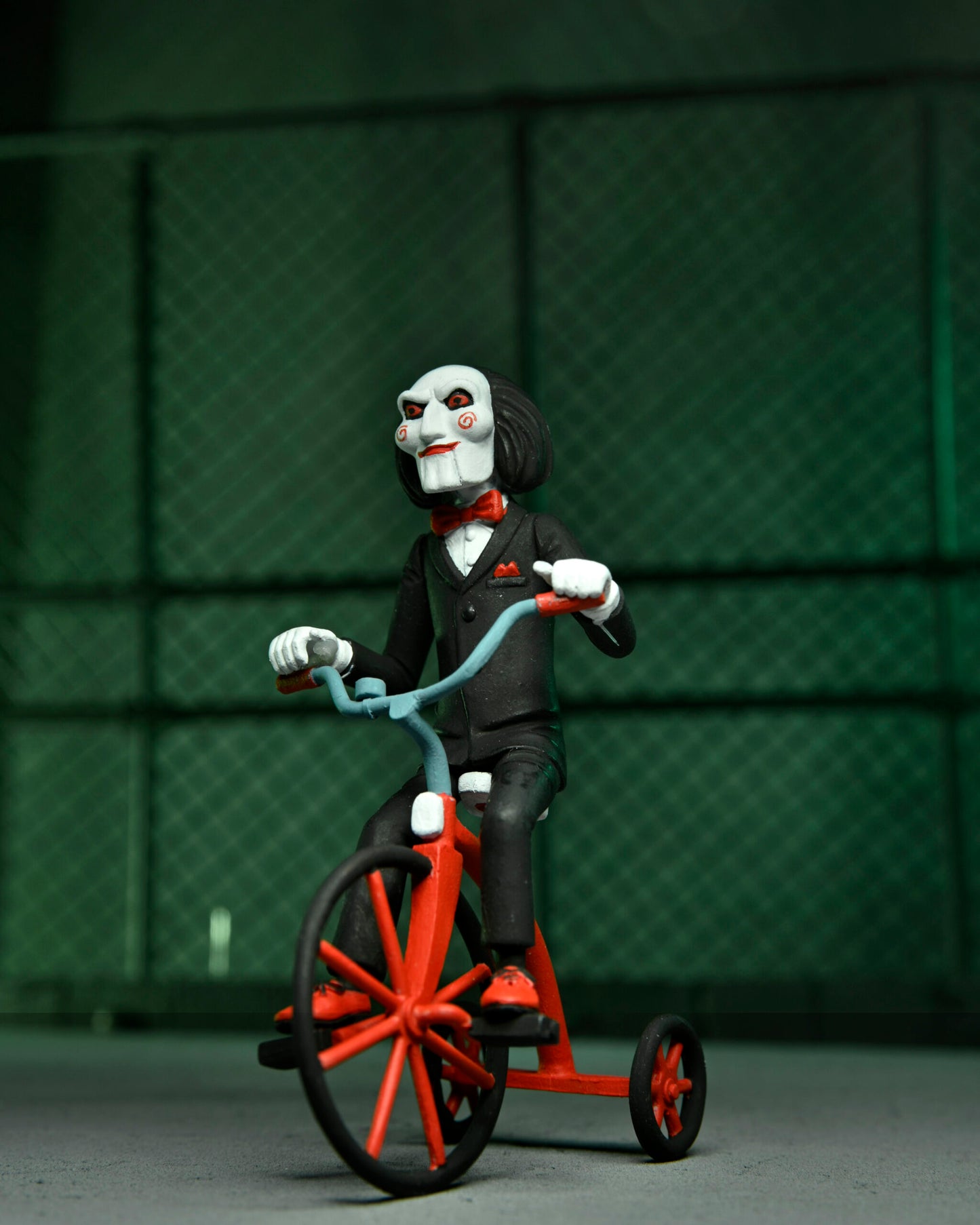 Saw: Toony Terrors Action Figure 2-Pack: Jigsaw Killer & Billy Tricycle